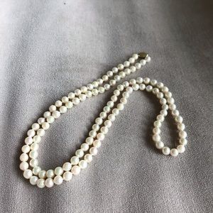 Cultured pearls 32”